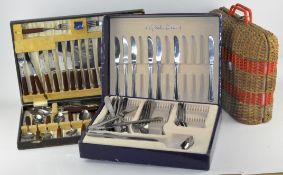 Two flatware cutlery sets, to include a tech handled set and another,