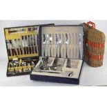 Two flatware cutlery sets, to include a tech handled set and another,