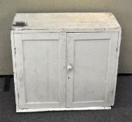 A pine white painted two door cupboard,