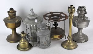 A collection of assorted lamps, to include a hanging lantern and brass oil lamps,