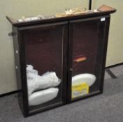 A wall mounted display cabinet,