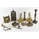 A collection of assorted items, including a brass dome shaped clock,