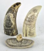 Two reproduction resin scrimshaws,