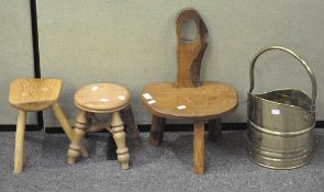 Two wooden stools, together with a similar sized child's seat,