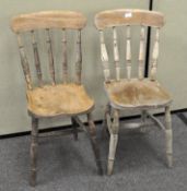 A pair of oak dining chairs,