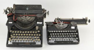 A Woodstock typewriter together with another,