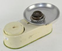 A set of vintage kitchen scales, with associated weights,