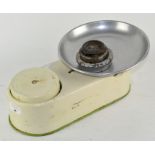 A set of vintage kitchen scales, with associated weights,