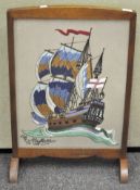 An Oak framed fire screen with embroidery to center, titled "the Mayflower",