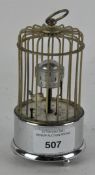 A vintage novelty Kaiser bird cage clock,