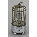 A vintage novelty Kaiser bird cage clock,