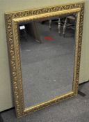 A large contemporary gilt framed mirror,