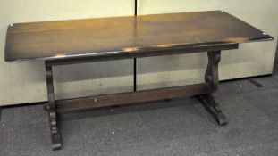 A large stained wood refrectory table,