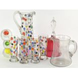 A selection of glassware, including large pouring glass with polka dot decoration,