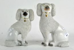 Two Staffordshire spaniels with shredded day coats, (A/F),