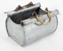 A French aluminium and brass container in the form of an open bag, stamped 'Therend' to one end,