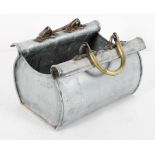 A French aluminium and brass container in the form of an open bag, stamped 'Therend' to one end,