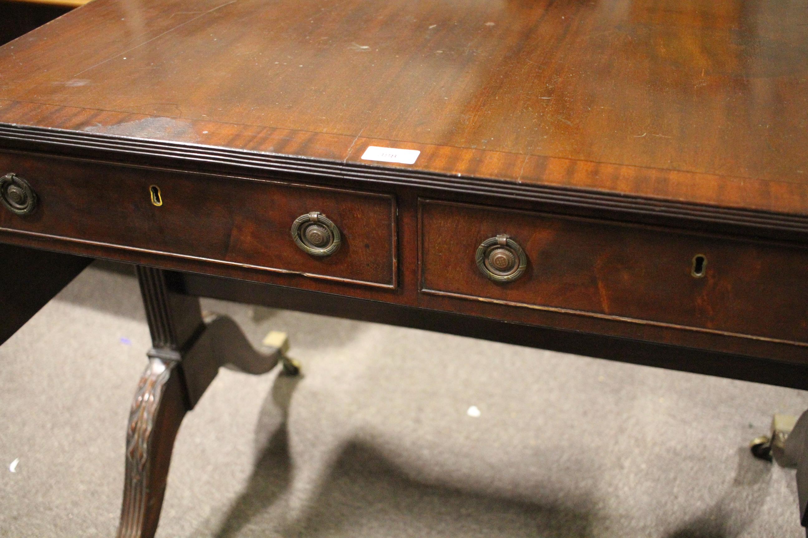 A Regency style mahogany and cross banded sofa table, drop leaves and two true drawers, - Image 7 of 11