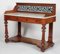 A Victorian mahogany and white marble wash stand,