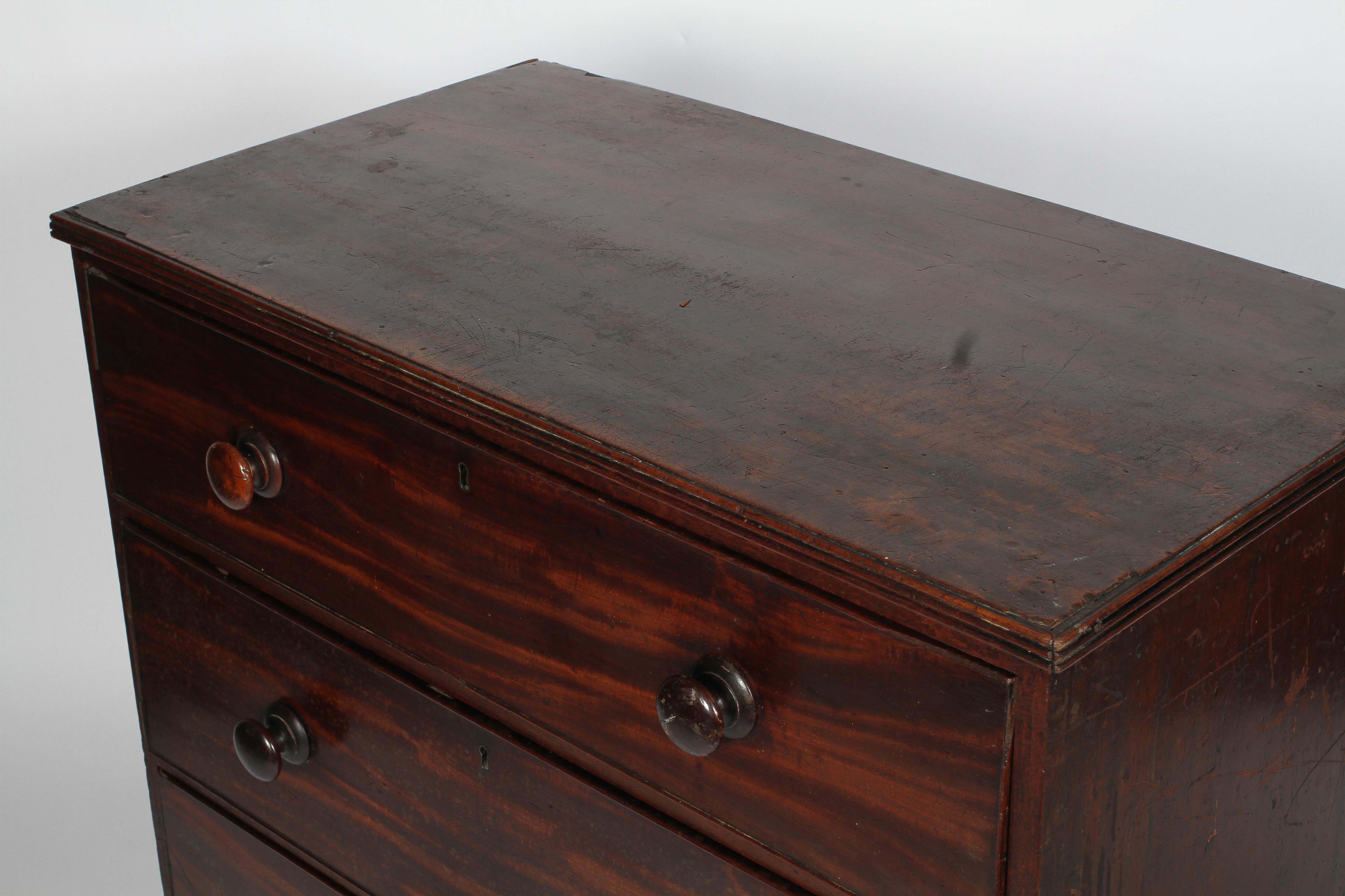A George III mahogany chest of three graduated long drawers, with turned pulls, - Image 2 of 2