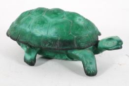 A malachite glass dish and cover in the form of a tortoise,