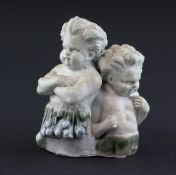 An English glazed stoneware group of two putti, late 19th century, possibly Doulton,