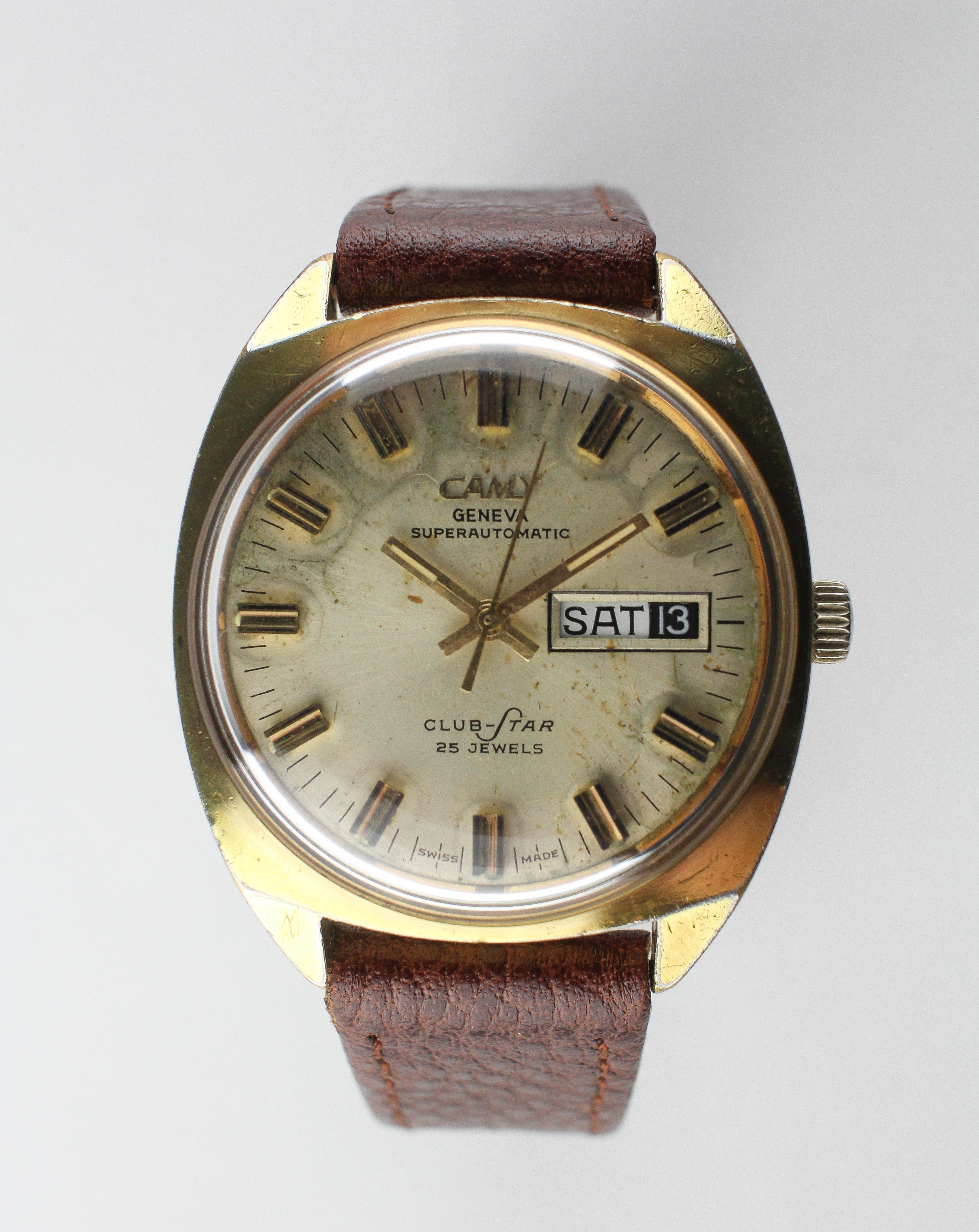 A gold plated Camly super automatic wristwatch.