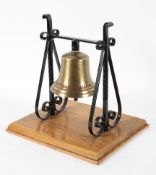 A Hythe Volunteer Fire Brigade brass bell on a wrought iron frame,