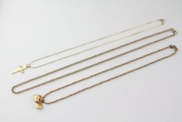 A collection of three necklaces to include A cross & chain,