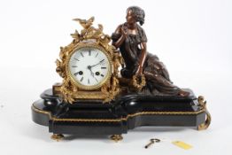 A French bronze and gilt metal mounted mantel clock,
