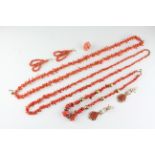 A collection of coral jewellery to include three necklaces,