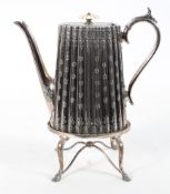 A silver plated coffee pot, of reeded tapering oval form, with ivory finial,
