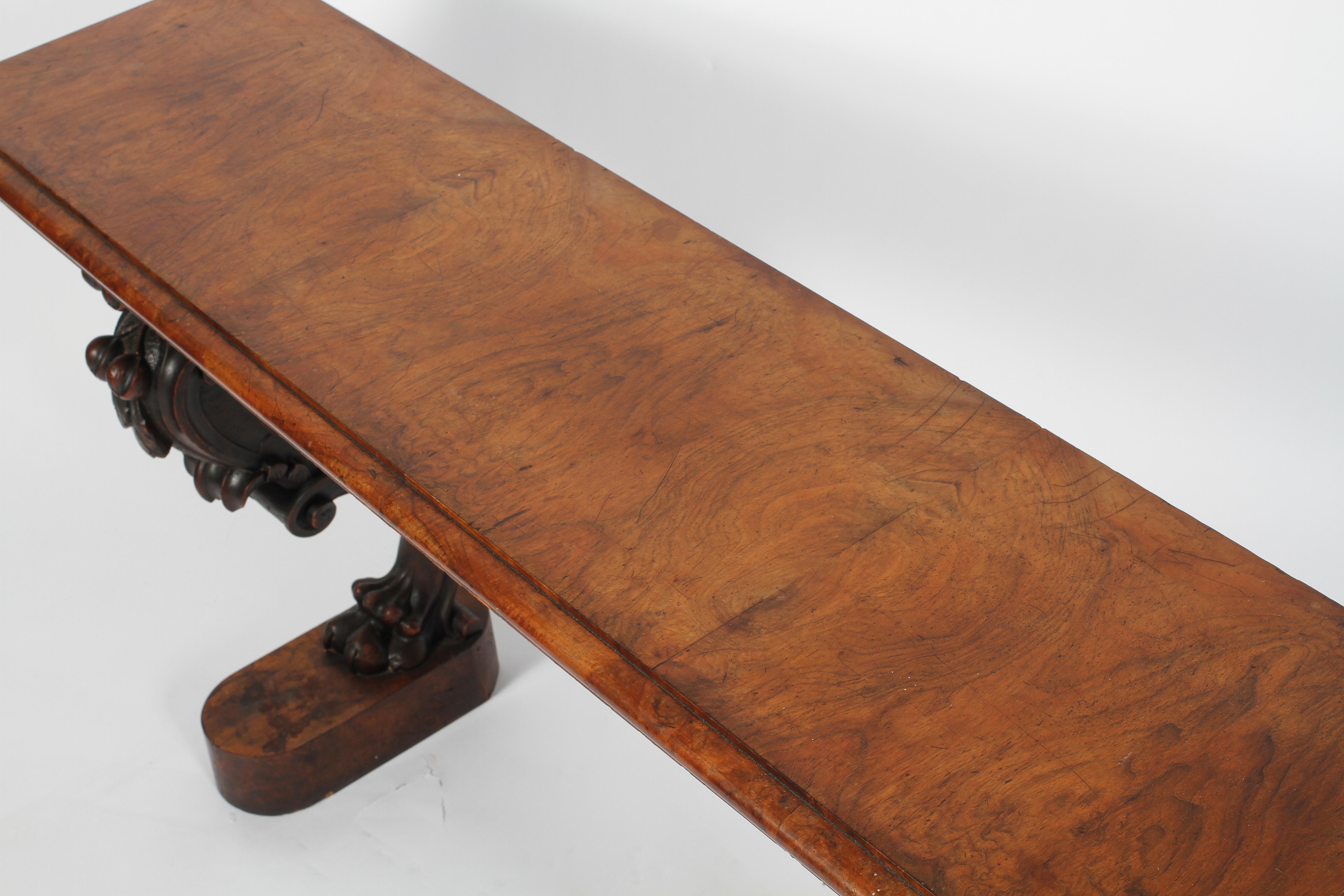 A Victorian walnut low side table, the moulded top on scrolling legs with lion paw feet, - Image 3 of 3