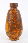 A large 1960's vintage West German floor vase, having a footed base and bulbous form,