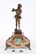 A French marble clock, the ivorine dial on a brass, eight day movement, striking to a bell,
