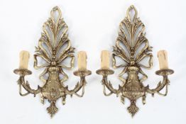 A pair of ornate brass two light wall sconces, 20th century,