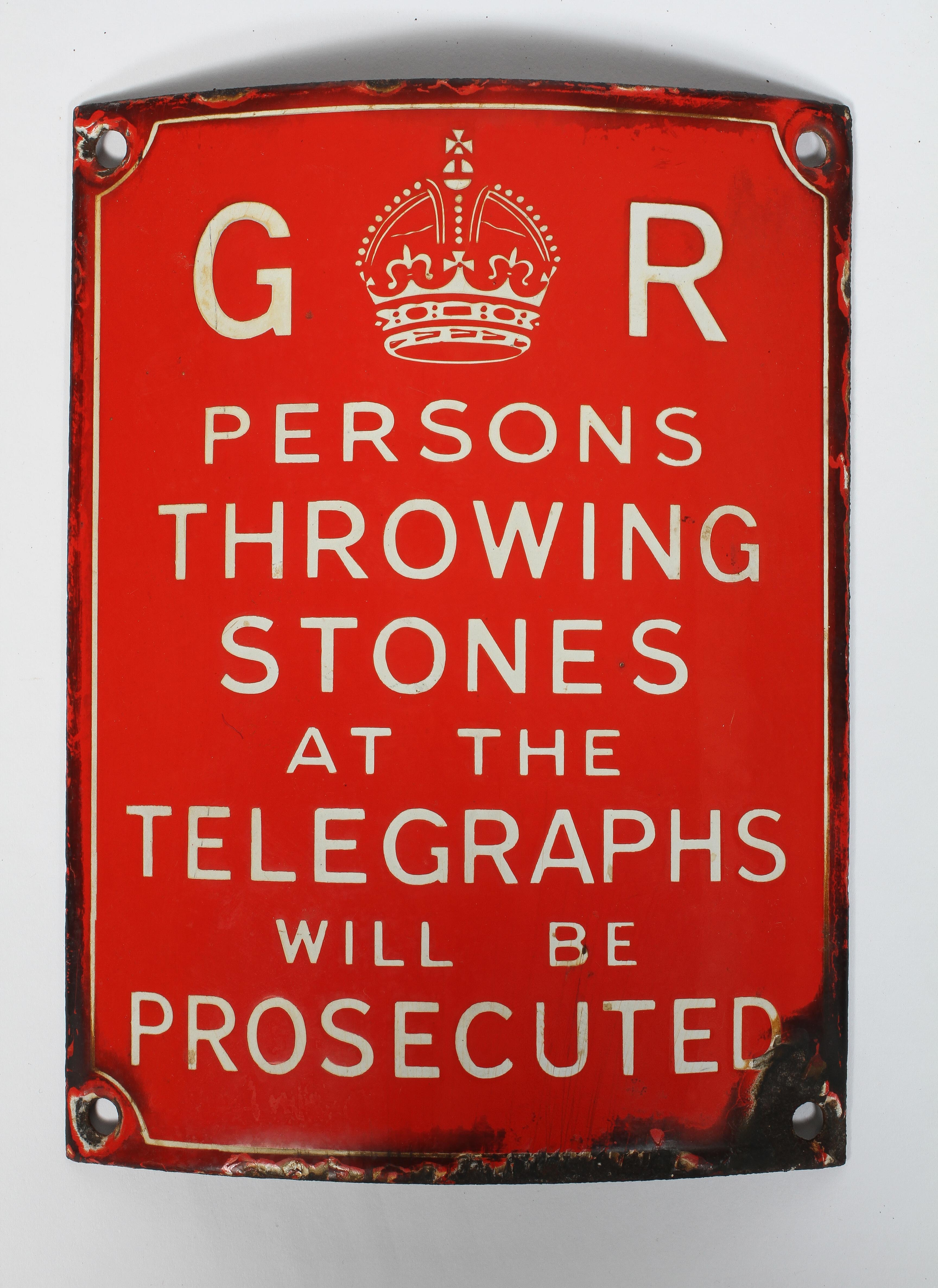 An enamelled sign, inscribed 'GR/Persons Throwing Stones at the Telegraphs will be Prosecuted',
