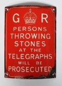 An enamelled sign, inscribed 'GR/Persons Throwing Stones at the Telegraphs will be Prosecuted',