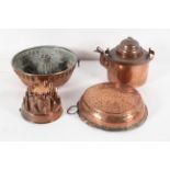 A copper mould, of 'castellated' form, 16cm diameter; another larger, of circular ring form,