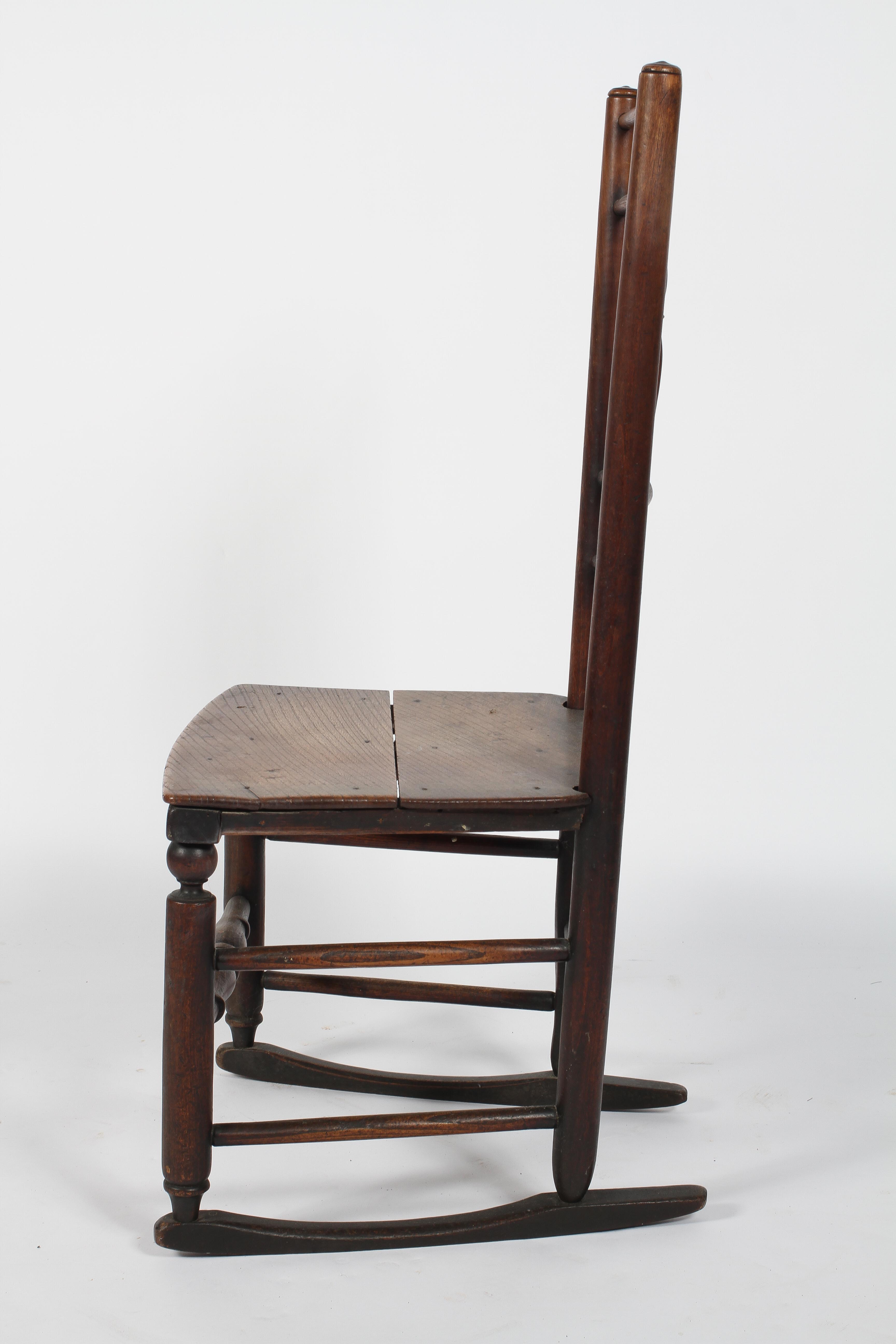 An ash and elm rocking chair, 19th century, with spindle back, two plank seat and box stretched, - Image 2 of 2