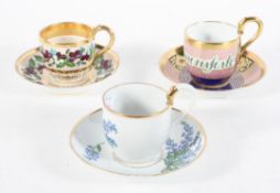 Three Empire style cups and saucers, early 19th century, with various painted designs,