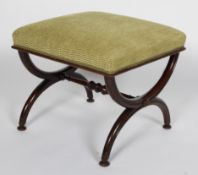 A Victorian mahogany X frame stool, with an upholstered rectangular seat,