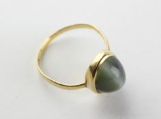 An antique Scottish 22k gold Cats Eye chrysoberyl ring, size Q,