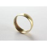 A yellow gold D shape 6mm wedding ring. Hallmarked 18ct gold, Birmingham, 973. Size: S (middle)