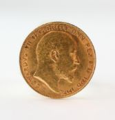 A loose half sovereign coin dated 1909.