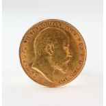 A loose half sovereign coin dated 1909.