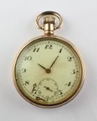 An open face pocket watch. Circular champagne dial with numerical markings.