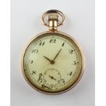 An open face pocket watch. Circular champagne dial with numerical markings.