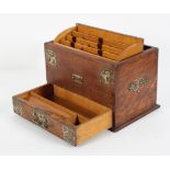 A Victorian oak and silver plate mounted metamorphic stationery box, with fitted interior,