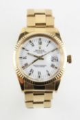 An 18ct yellow gold Rolex oyster perpetual date wristwatch.